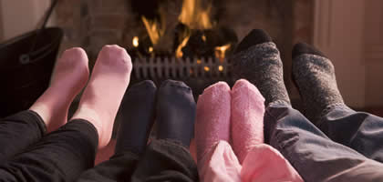 All Snug And Cozy, Warming Feet By The Fire
